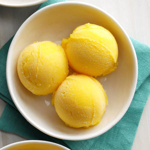 Celebrate the first week of summer with this delectable mango sorbet that can be effortlessly prepared using only three ingredients.