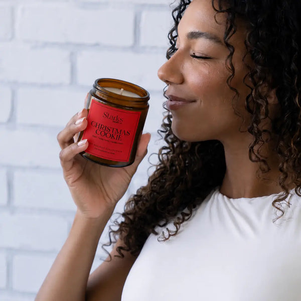 Customer enjoying the scent of Starks Christmas Cookie amber jar candle
