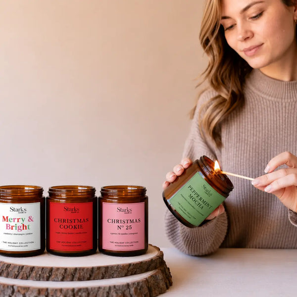 Starks holiday candle collection with candles being lit