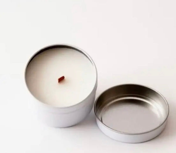 Open Sandstone + Spice 4 oz silver candle tin showing soy wax and wood wick